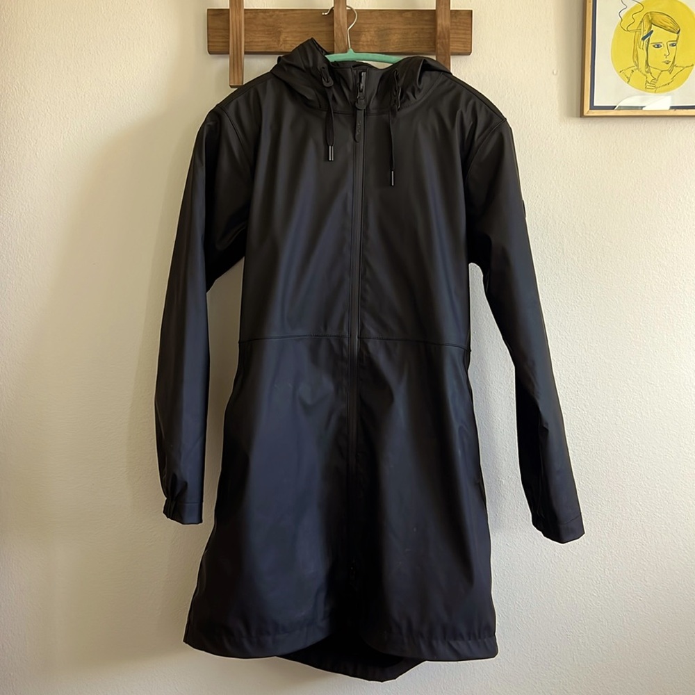 Tanta size medium long black raincoat.